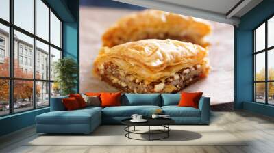 two pieces of baklava on wax paper Wall mural