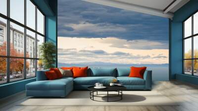 sea ocean and dark blue sky clouds Wall mural