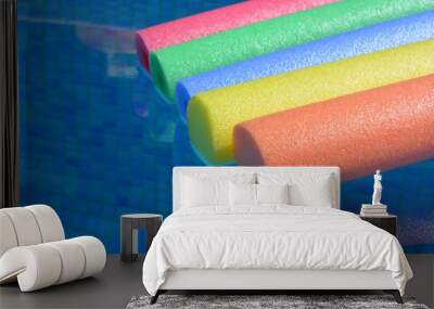 colorful pool noodles in a swimming pool Wall mural