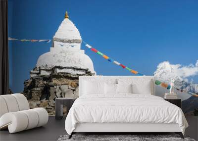 Old white stupa and prayer flags near Pangboche with Ama Dablam in the background, Everest Base Camp trek, Sagarmatha National Park, Nepal Wall mural