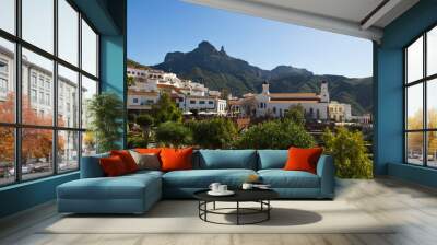 Great views of Tejeda old town with Roque Nublo mountain on the background in Gran Canaria, Spain. Sunny day on iconic tourist destination. Summer vacation tour visit concept Wall mural