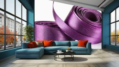 shiny satin ribbon in lilac color isolated on white background close up Wall mural