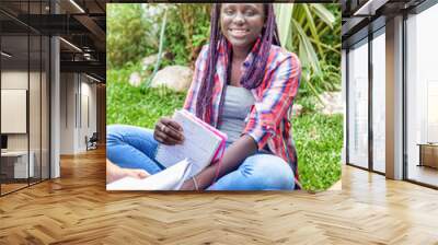 African girl outdoor making school lesson Wall mural