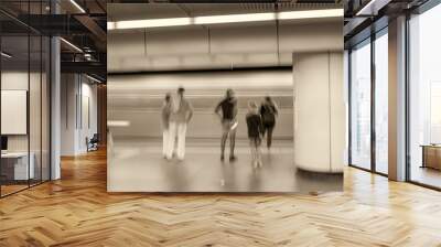 Blurred movement of people inside a subway station. Business and travel concept Wall mural