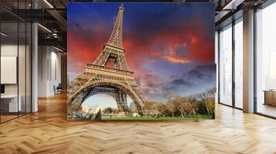 eiffel tower in paris under a thunder-charged sky Wall mural