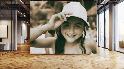 Happy young girl on holiday Wall mural