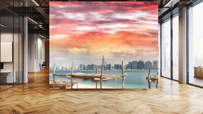 Panoramic view of Abu Dhabi Downtown skyline from the beach at sunset, UAE Wall mural