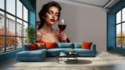 A beautiful sexy attractive woman holding a glass of red wine Wall mural