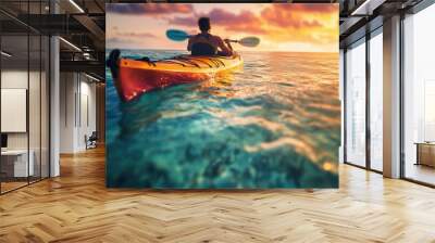 A person kayaking in clear beautiful tropical sea water at sunset Wall mural