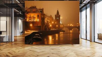 Beautiful historical buildings in winter with snow and fog in Prague city in Czech Republic in Europe. Wall mural