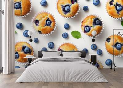 Blueberry fruit and muffin cupcake isolated over white background Wall mural