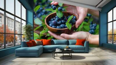 Fresh blueberry fruit in wooden bowl Wall mural