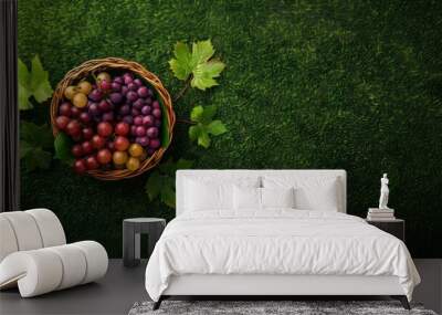 Grape fruit in basket on lawn Wall mural