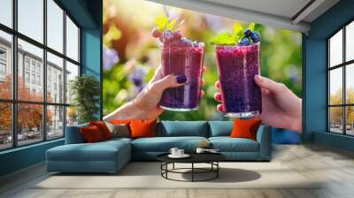 Hand hold summer drink with blueberry fruit Wall mural