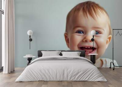 Happy smiling baby with plain background Wall mural