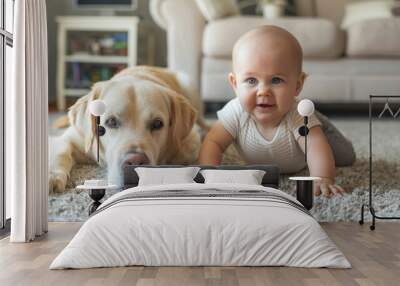 Little baby with puppy dog on carpet floor at home. Wall mural