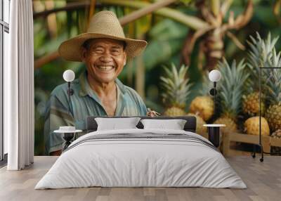 Portrait of a smiling male farmer with fresh pineapple Wall mural