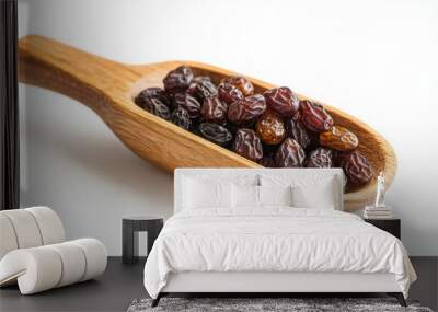 Raisin grain in wooden scoop spoon closeup view Wall mural