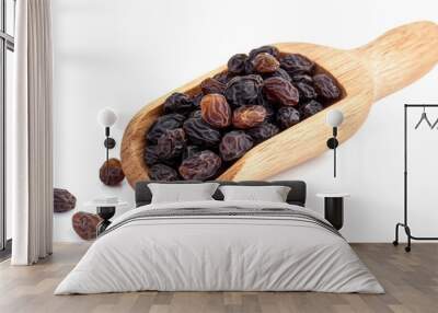 Raisin grain in wooden spoon closeup view Wall mural