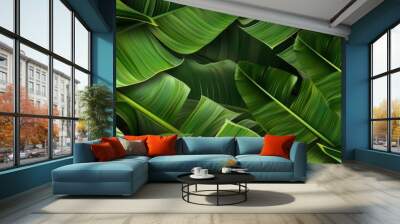 Seamless pattern background of fresh banana plant leaf Wall mural