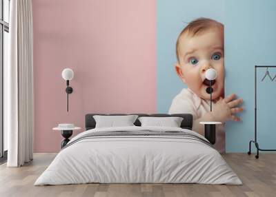 Surprised baby peeping with plain background Wall mural