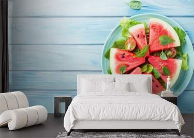 Top view of a plate of fresh sweet ripe watermelon slices on wooden table Wall mural