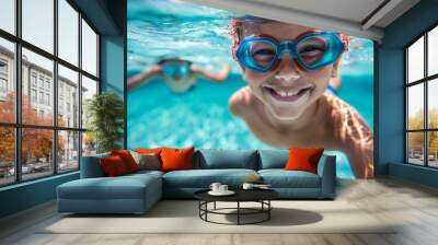 Underwater portrait of happy child in swimming pool. Wall mural