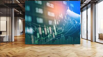 Businessman writing the trading graph of stock market on digital stock market financial exchange and Trading graph Wall mural