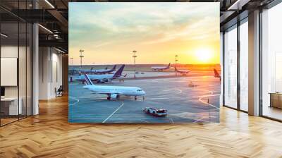 Modern airport at sunset Wall mural