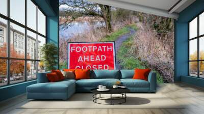 Red footpath ahead closed warning sign on a countryside trail Wall mural