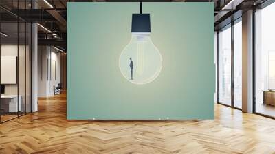 Business creativity vector symbol with businessman standing in lightbulb. Wall mural