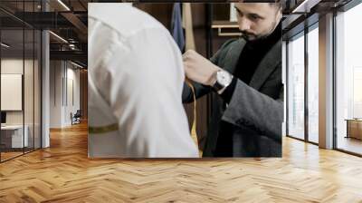  tailor taking measurements Wall mural