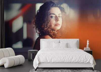 close-up portrait of beautiful curly woman Wall mural