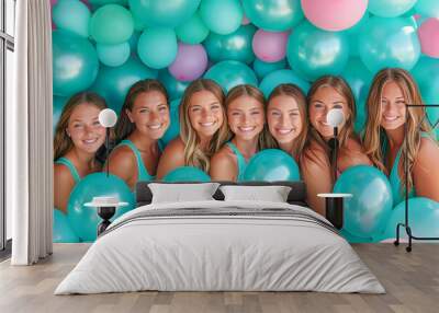 Cheerful girls celebrating with turquoise and pink balloons Wall mural