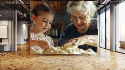 A woman and boy decorating gingerbread cookies. Wall mural