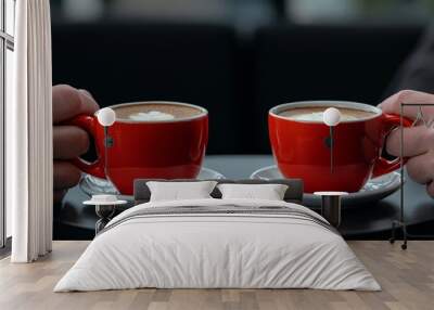 A casual photo of a business negotiation taking place in an office lounge, with coffee cups on the table and a relaxed yet professional atmosphere Wall mural