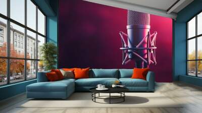 Professional microphone illuminated by neon lights in a dark recording studio, modern audio production and music recording concept Wall mural