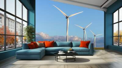 wind mill or also wind-turbine on wind farm in rotation to generate electricity energy Wall mural