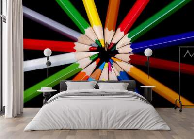 Assortment of coloured pencils with shadow on white/back backgro Wall mural