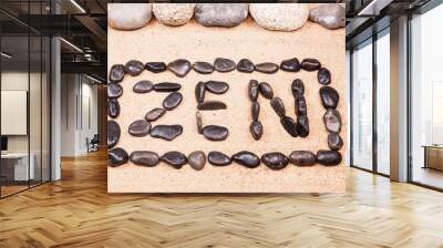 zen word written with pebbles on the sand of a beach Wall mural