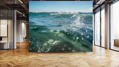 Split low level shot above and below water showing blue sky and sand ocean bed. A.I. generated.
 Wall mural