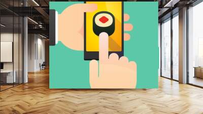 Man's hands using a phone showing a piece of sushi Wall mural