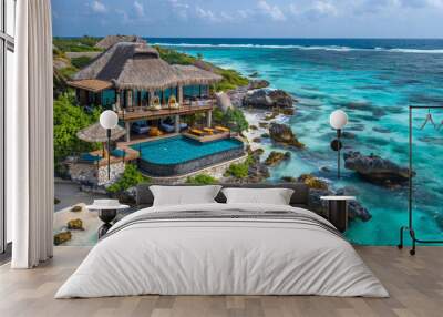 A beach house with a pool and a view of the ocean Wall mural