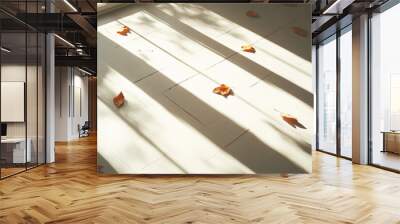 A white tile floor with leaves scattered across it Wall mural