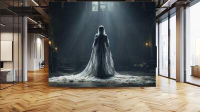 a woman in a long white dress disguised as a ghost in a dark, ramshackle room Wall mural