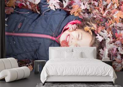 girl with autumn leaves Wall mural