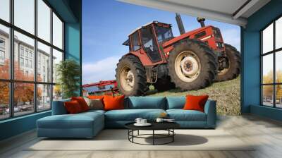 Tractor against a blue sky Wall mural