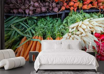 Fresh organic root vegetables at a local farmers market. Wall mural