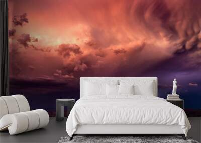 Stormy sky with lightning at sunset Wall mural