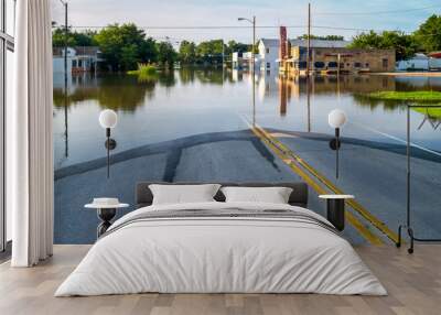 Flooded business street in a small town. Wall mural